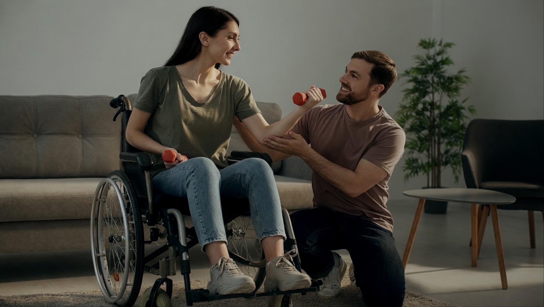 A man helps a woman in a wheelchair